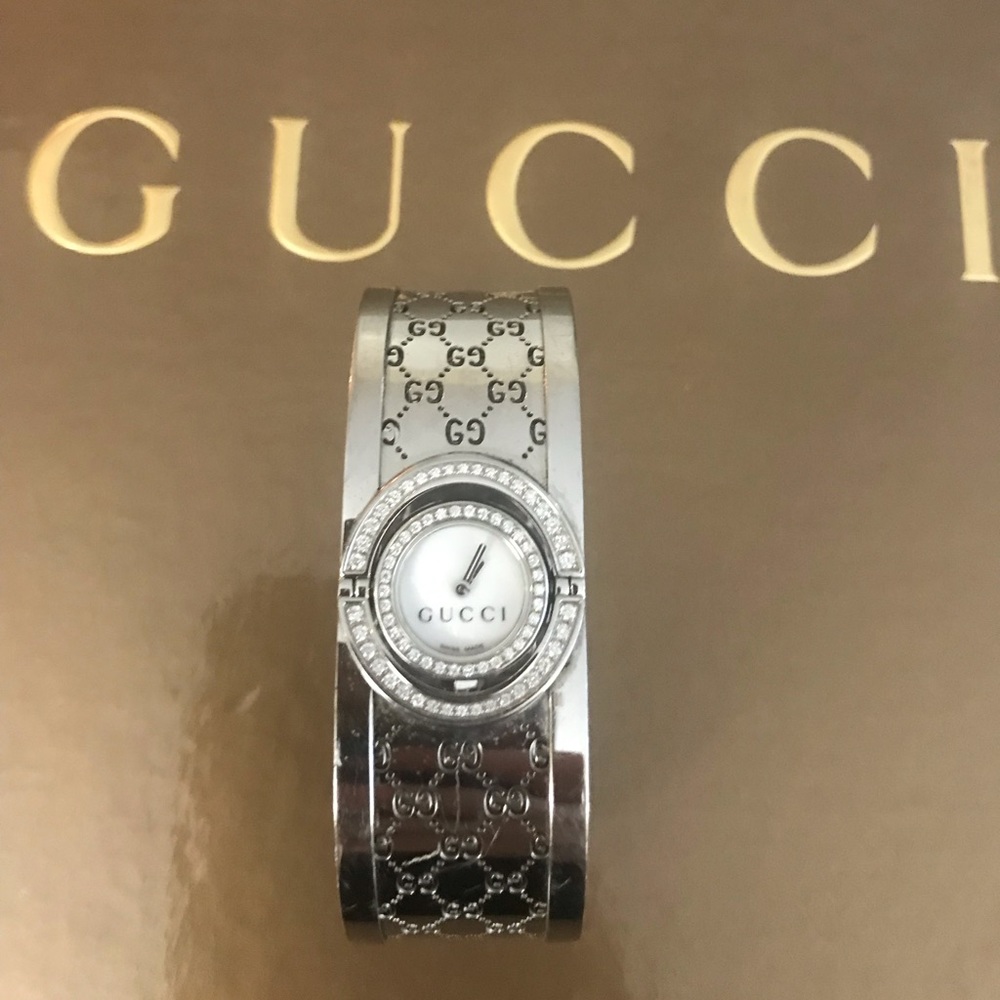 Gucci twirl face watch, mother of Perl and diamond